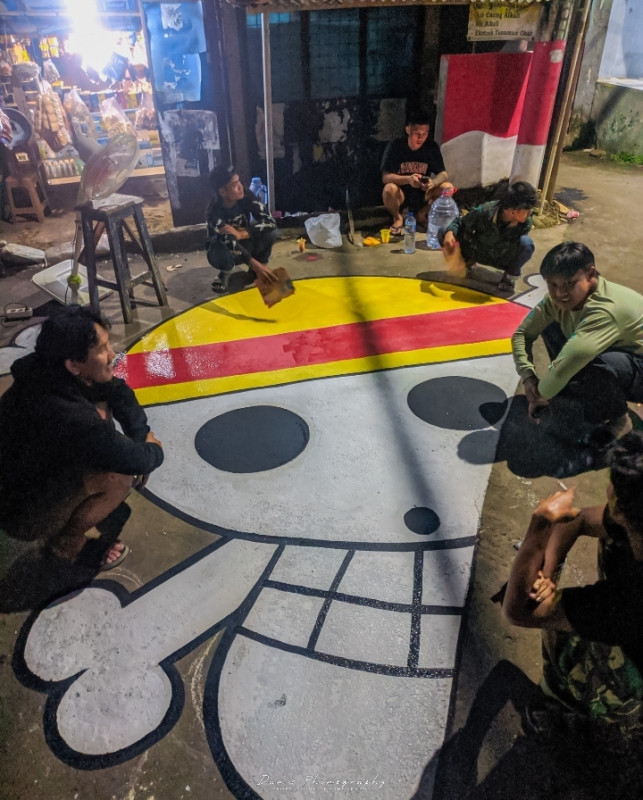 WARGA KARANG TENGAH BUAT MURAL ONE PIECE DI JALAN RAYA, DIDUGA EKSPRESIKAN KEKECEWAAN TERHADAP PENGASPALAN YANG TAK MERATA